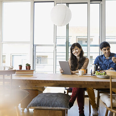 Couple eating at table